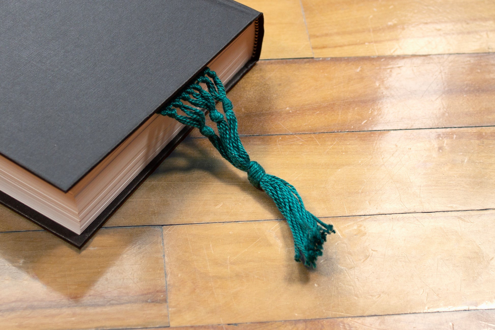 Cotton bookmark, Green medium, handmade, natural fibres, decorative fringe, woven in Canada