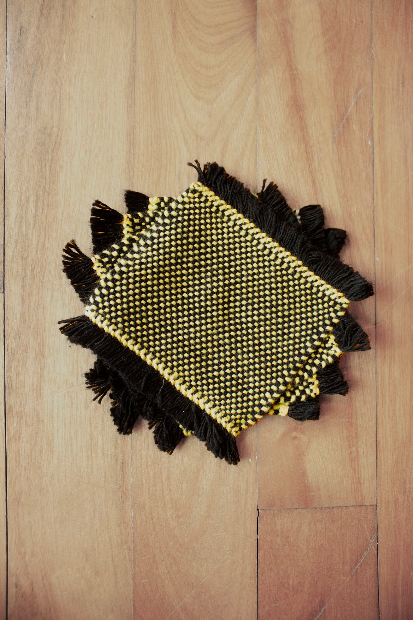 Cotton coasters: Set of four, hemstitched, black and yellow, handmade, washer safe, soft, woven in Canada