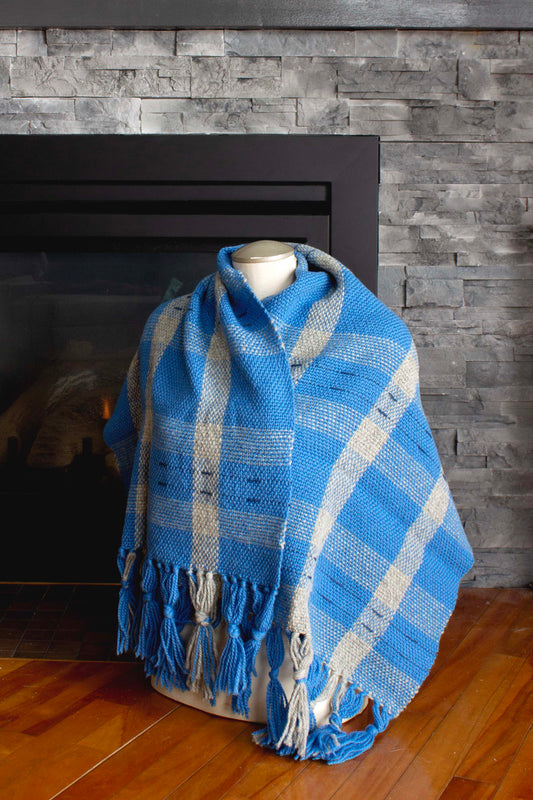 Wool blanket scarf, accented blue plaid, weft floats, grey, light blue, dark blue, handmade, natural fibres, Andean highland wool, cotton thread, local wool, reclaimed loom waste, locally sourced yarn, woven in Canada